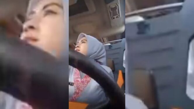 
					Wanita Berhijab Bekerja Sebagai Supir Bus Antarkota